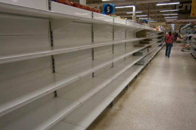Empty shelves in a Venezuelan market March 2014 Credit The Photographer via Wikimedia CC0 10 CNA