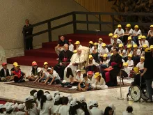 Pope Francis meets with children at the Vatican's Paul VI Hall on May 11, 2015. 