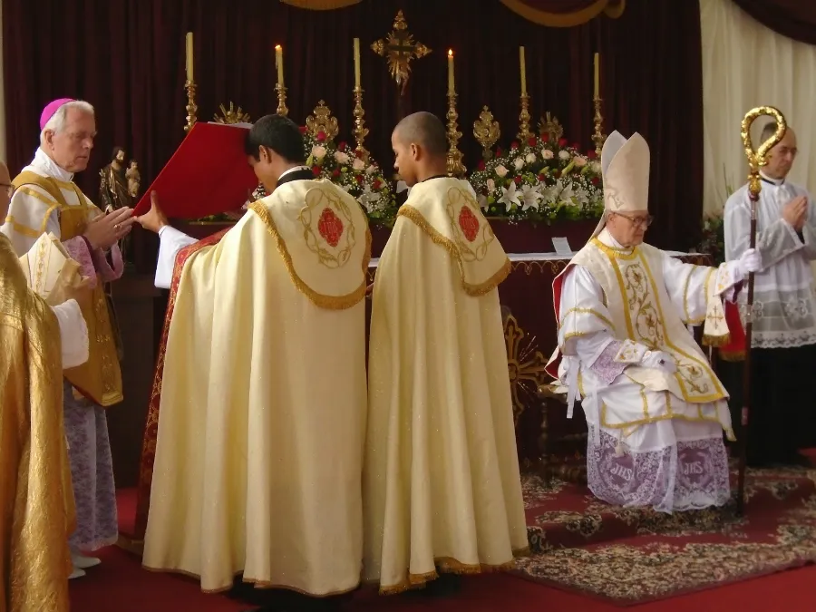 Episcopal consecration of Fr Faure (sitting) by Bp Williamson March 19, 2015.?w=200&h=150