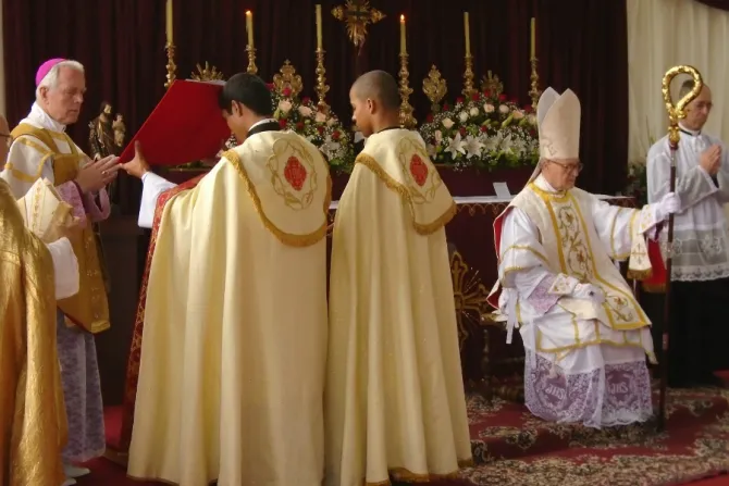 Episcopal consecration of Fr Faure sitting by Bp Williamson 2015 March 19 Credit Union Sacerdotal Marcel Lefebvre   CNA