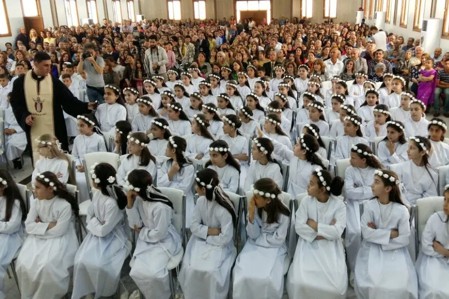Refugee children in Erbil receive their First Communion May 27, 2016. Photo courtesy of Deacon Roni Momica.?w=200&h=150