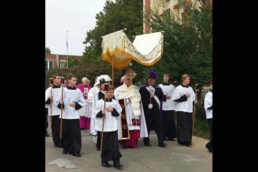 Archbishop Paul Coakley of Oklahoma City carries the Eucharist in procession Sept. 21 to counter a black mass held at the city's civic music hall. ?w=200&h=150