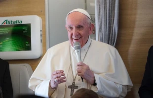 Pope Francis speaks during an in-flight press conference en route from Rome to Iraq March 8, 2021. Caption: Colm Flynn/CNA.