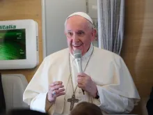 Pope Francis speaks during an in-flight press conference en route from Rome to Iraq March 8, 2021. Caption: Colm Flynn/CNA.