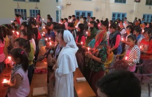 Faithful in the Diocese of Miao pray for persecuted Christians in the Middle East.   Fr. Felix Anthony.