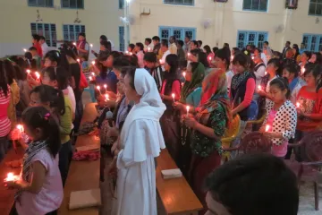 Faithful praying with Pope Francis in Miao diocese for persecuted Christians in Middle East  Credit Fr Felix Anthony CNA