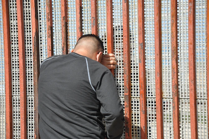 Families meet through the border fence Credit BBC World Service via Flickr CC BY NC 20 CNA 5 13 15