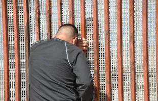 Families meet through the border fence.   BBC World Service via Flickr (CC BY-NC 2.0).