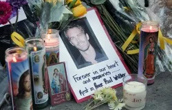 Fans pay tribute to actor Paul Walker on Dec. 1, 2013 at the site of his fatal car accident in Valencia, CA. ?w=200&h=150