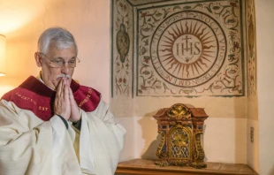 Father Arturo Sosa, the newly elected Superior General of the Society of Jesus, prepares to say Mass at the Gesu in Rome, Oct. 15, 2016.   GC36 via Flickr.