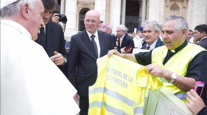 Father José Aumenté presents Pope Francis with a reflective vest of the Spanish bishops' highway ministry. Photo courtesy of Fr. José Aumenté.?w=200&h=150