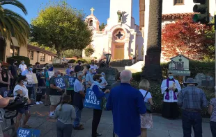 Father Kyle Faller leads prayers at the site of a destroyed statue of St. Junipero Serra on Oct. 13, 2020.   Valerie Schmalz/Archdiocese of San Francisco