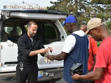 Father Marko Djonovic works with homeless men as part of Better Way Detroit. 