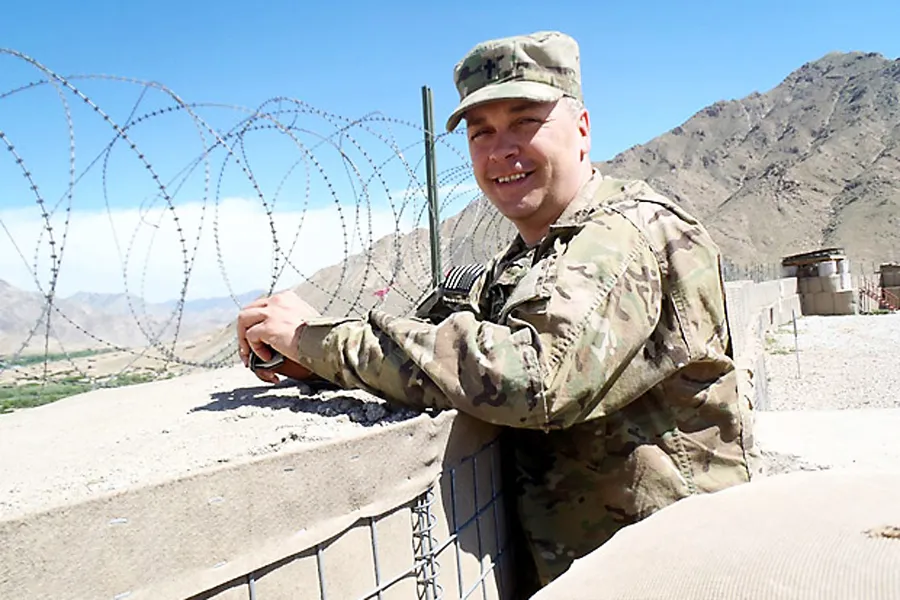 Father Stephen McDermott surveys the landscape in Afghanistan, where he served for the last year, earning the Army's Bronze Star. ?w=200&h=150
