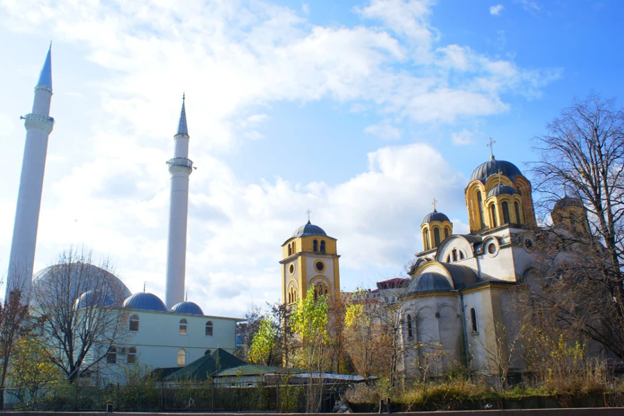 A church and a mosque adjacent one another in Ferizaj, Kosovo. ?w=200&h=150