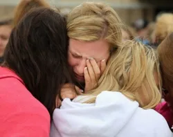 Locals console each other after a fertilizer plant explosion n West, Texas. ?w=200&h=150