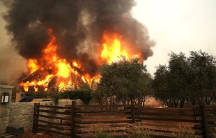 Fire consumes a barn as an out of control wildfire moves through the area in Glen Ellen, Calif., Oct 9, 2017.   Justin Sullivan/Getty Images.