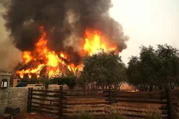 Fire consumes a barn as an out of control wildfire moves through the area on October 9 2017 in Glen Ellen California Credit Justin Sullivan Getty Images