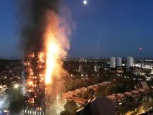 Fire engulfs the 24-story Grenfell Tower in Latimer Road, West London in the early hours of this morning on June 14, 2017 in London, England. 