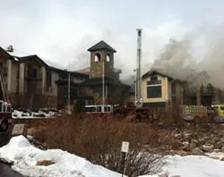 Firefighters respond to a fire at the St. Malo Retreat Center near Allenspark, Colo.?w=200&h=150