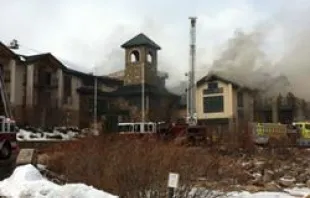 Firefighters respond to a fire at the St. Malo Retreat Center near Allenspark, Colo. 