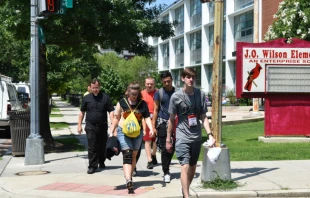 Father Bill Carloni with a group of volunteers at the Holy Name of Jesus food pantry in Washington, D.C.   Christine Rousselle/CNA.