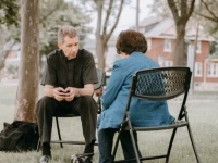Fr. David Burgard participates in "Priests in the Park." 