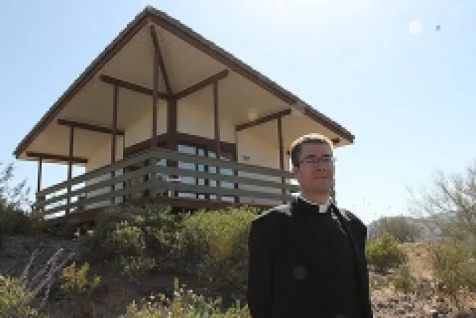 Fr Eugene Florea stands in front of the newly built hermitages Credit JD Long Garcia Catholic Sun CNA US Catholic News 6 19 13