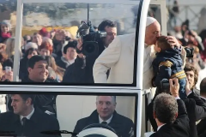 Fr Fabrian Baez back left was invited to ride in the back of the popemobile after being spotted by Pope Francis in St Peters Square Jan 8 2014 Credit Kyle Burkhart CNA CNA