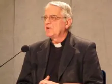 Father Federico Lombardi addresses the press on Feb. 11, 2013 about Pope Benedict XVI's resignation. 