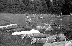 Fr. Francis Sampson, known as the 'Parachute Padre', gives last rites to paratroopers killed in action during the D-Day invasion of Normandy. ?w=200&h=150