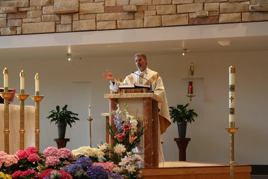 Fr. Gregory Bierbaum speaks at Mass May 9. ?w=200&h=150
