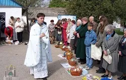 Fr. Mykola Kvych, naval chaplain in Sevastopol, blesses Easter baskets in 2013.?w=200&h=150