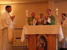 Fr. Pacwa at Mass with Bishop Peter J. Jugis of Charlotte