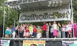 Fr. Quinn Mann, founder of CYE and CatholicFest, invited all the kids to join him on stage and sing a song during the last Mass, July 6, 2014. ?w=200&h=150