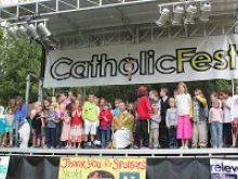 Fr. Quinn Mann, founder of CYE and CatholicFest, invited all the kids to join him on stage and sing a song during the last Mass, July 6, 2014. 