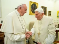 Pope Francis greets Pope Emeritus Benedict XVI Dec. 21, 2018. 