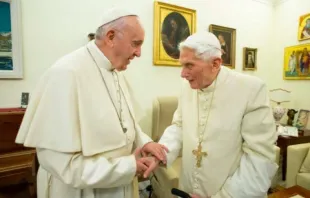 Pope Francis greets Pope Emeritus Benedict XVI Dec. 21, 2018.   Vatican Media.