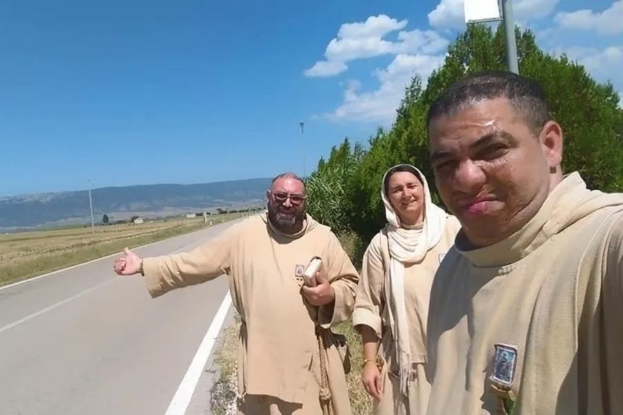 Friar Juan Maria Crisostomo (Right) hitchhiking with a fellow friar and Little Sister of Jesus and Mary. ?w=200&h=150