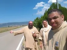 Friar Juan Maria Crisostomo (Right) hitchhiking with a fellow friar and Little Sister of Jesus and Mary. 