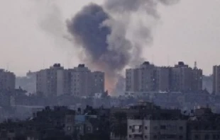 Smoke rises from Gaza after it was hit by Israeli airstrikes on Nov. 14, 2012.   lpj.org