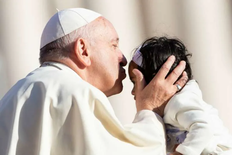 Pope Francis kisses a child at the general audience on Oct. 10, 2018. ?w=200&h=150