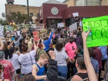 Crowds protest police violence after the killing of George Floyd in Minneapolis, Minn., May 2020. 