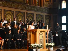 Sanda Green Thomas, president of GU272 Descendants Association, speaks at the Liturgy of Remembrance, Contrition and Hope at Georgetown University, April 18, 2017. 