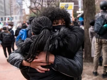 People in Minneapolis react after the verdict was read in the Derek Chauvin trial on April 20, 2021.