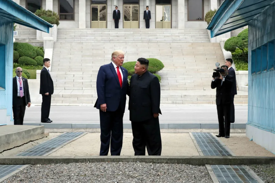 Kim Jong Un and Donald Trump meet at the DMZ separating the South and North Korea on June 30, 2019. ?w=200&h=150