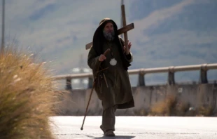 Biagio Conte, a lay missionary based in Palermo, is seen doing a pilgrimage in an almost deserted street March 20, 2020, in Palermo, Italy.   Getty Images.