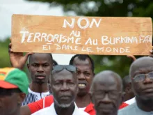 Protestors demonstrate against terrorism in central Ouagadougou on August 19, 2017. 
