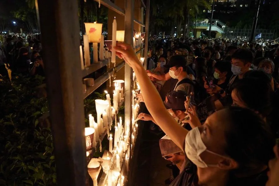 People light candles as they attend a vigil in Victoria Park in Hong Kong on June 4, 2020. ?w=200&h=150