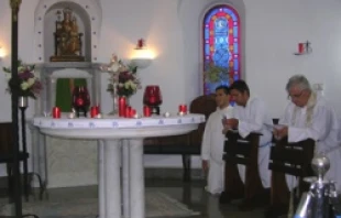 Monsignor Ralph Heskett leading the Rosary with Blessed Sacrament exposed on June 15, 2012.